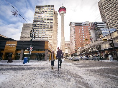 Calgary, Alberta in Winter A Couple Walking through Downtown Calgary in Winter