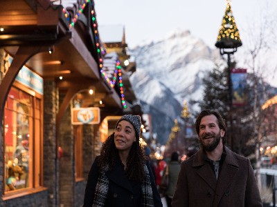 Banff, Alberta in Winter A couple walking in Banff, Alberta in winter